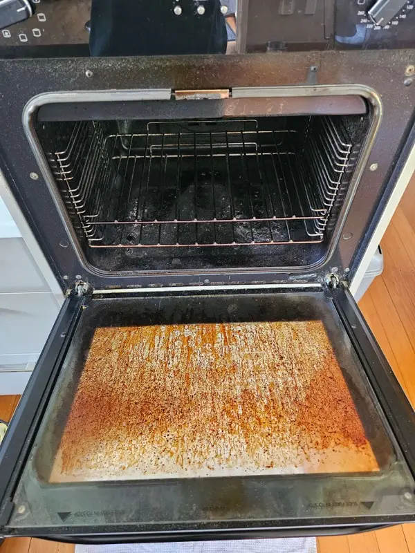Oven door glass before cleaning by SN Cleaning Services, Christchurch
